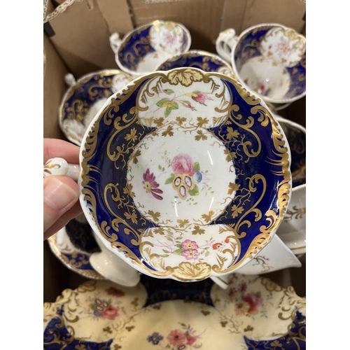 571 - 19th Century Staffordshire china floral pattern 22 piece teaset, royal blue panels with gilt decorat... 