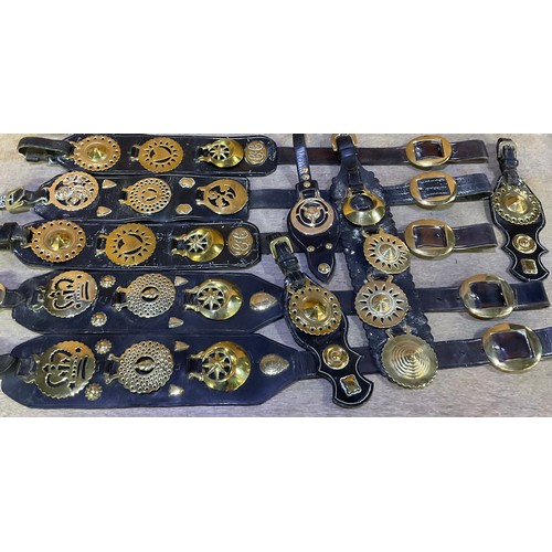 691 - Collection of approx 50 Victorian and later Horse brasses, some on leather straps for C & Co. and Jo... 