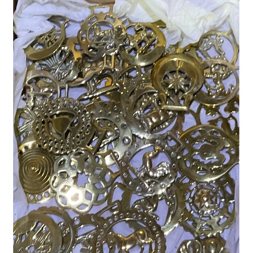 691 - Collection of approx 50 Victorian and later Horse brasses, some on leather straps for C & Co. and Jo... 