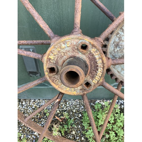 819 - Pair of cast metal large driving wheels by Alfred Royal of Doncaster