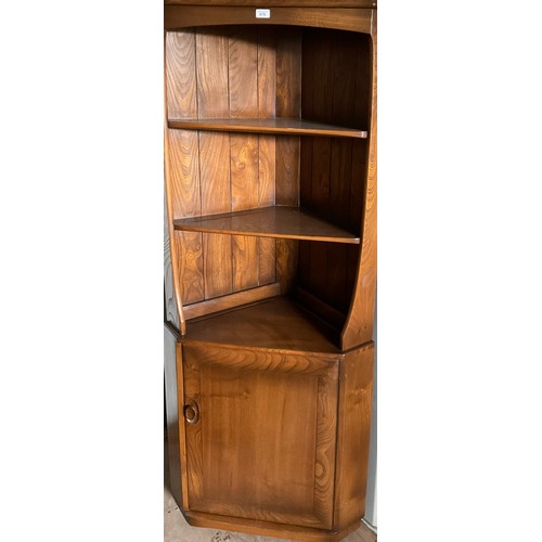 678 - Ercol dark elm corner cabinet, W77cm D43cm H180cm