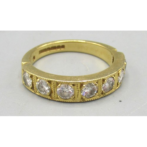 4 - 18ct yellow gold ring set with seven clear stones, stamped 750, P1/2,  5.69g