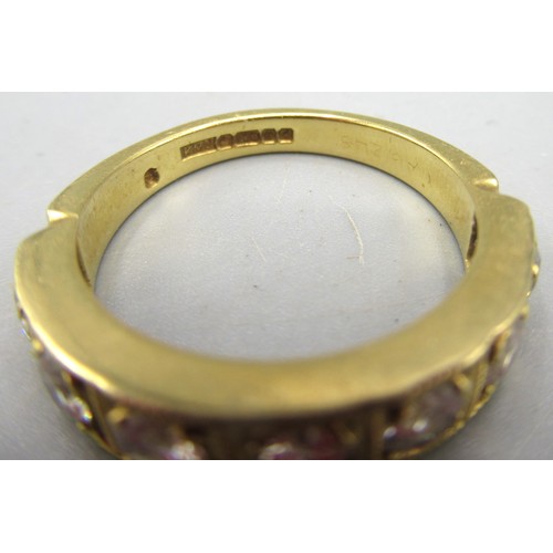 4 - 18ct yellow gold ring set with seven clear stones, stamped 750, P1/2,  5.69g