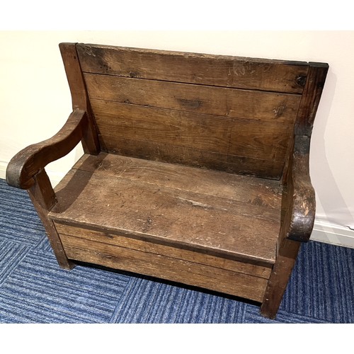 827 - Small pine and oak settle shaped arms and side drawer, W93cm D48cm H83cm