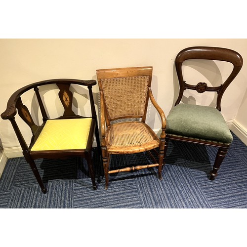 831 - Edwardian inlaid mahogany corner chair, Victorian balloon back chair and a Victorian arm chair with ... 