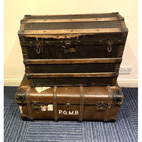 839 - Vintage luggage - a Victorian wooden bound dome top trunk on casters, a wooden bound trunk, both wit... 