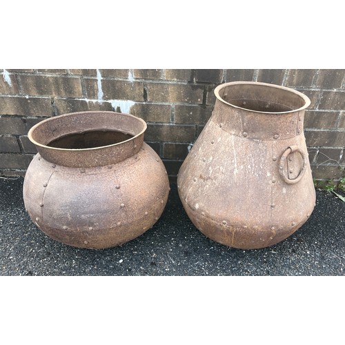 856 - Two Indian metal cooking pots