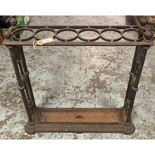 140 - Early 20th century painted cast iron rectangular six division stick stand, floral and rosette cast e... 