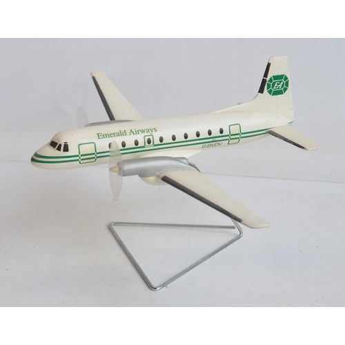 1275 - Resin/polyurethane foam solid Emerald Airways Hawker Siddeley HS748 airliner model on stand with spi... 