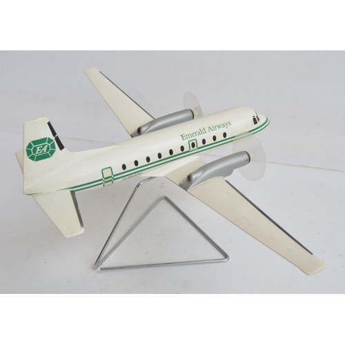 1275 - Resin/polyurethane foam solid Emerald Airways Hawker Siddeley HS748 airliner model on stand with spi... 