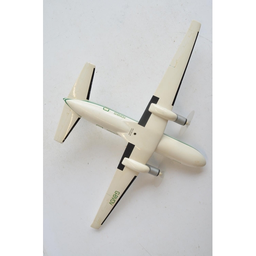 1275 - Resin/polyurethane foam solid Emerald Airways Hawker Siddeley HS748 airliner model on stand with spi... 