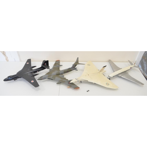 1285 - Four built 1/72 scale plastic model kits to include Victor, Valiant, Vulcan and a Comet, mostly spra... 