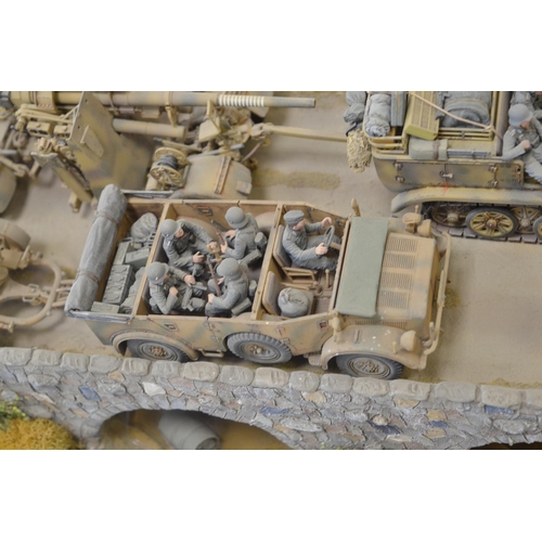 1296 - Well made and highly detailed 1/35 scale plastic model WWII diorama, depicting German armour crossin... 