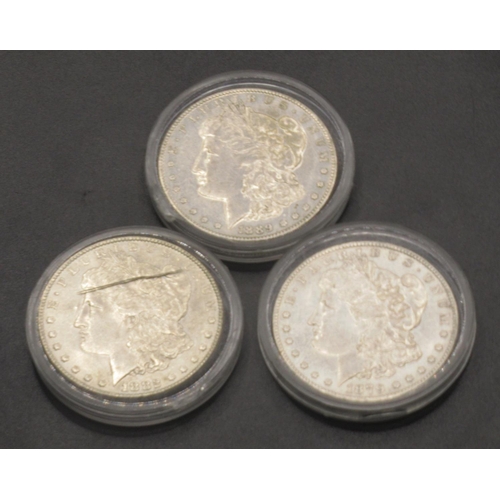 673 - Carson City Mint - 1879 silver dollar, 1882 silver dollar and a 1889 silver dollar, all encapsulated... 