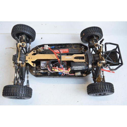 1346 - Tamiya Boomerang and Maverick Strada battery powered 4 wheel drive radio controlled cars, both in wo... 