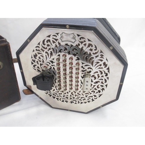 898 - C. Wheatstone & Co Concertina, No. 33051, with sixty-five metal buttons, hexagonal and chrome plated... 