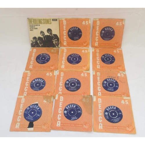 913 - Assorted collection of 45' singles from the Rolling Stone and the Beatles, to inc. 4 postcards of th... 