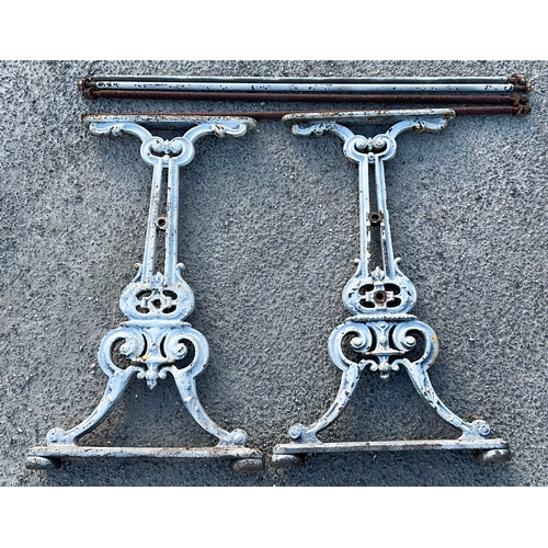 858 - Pair of Victorian cast iron white pained bench ends and struts