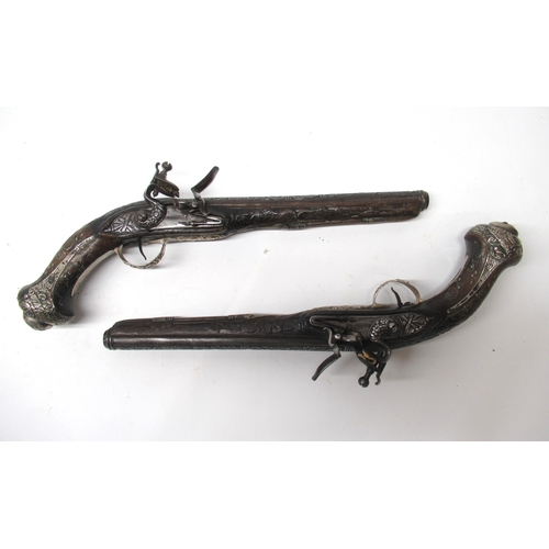 21 - Pair of elaborate C18th century Turkish flintlock 20 bore holster pistols, 10