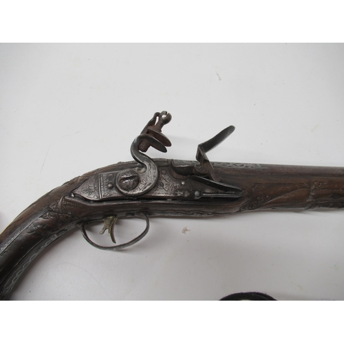 23 - 18th/19th century silver (white metal) inliad 14 bore Turkish flintlock pistol, 9