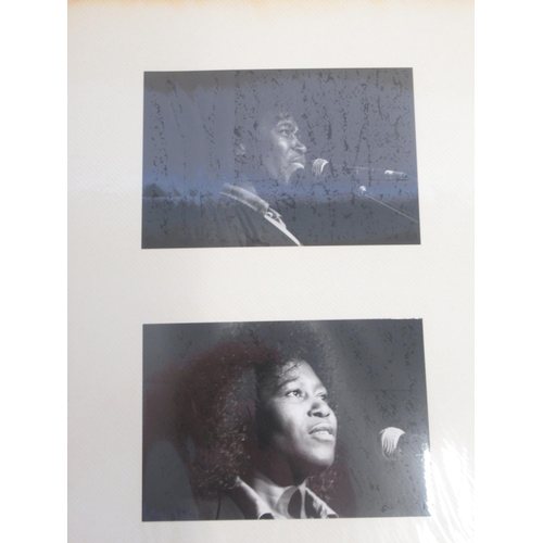 921 - Framed and signed Joan Armatrading picture with 2 guitar picks and a photo album collection of Joan ... 