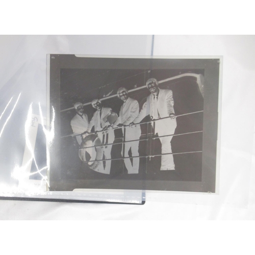 927 - Beatles -  folder cont. 14 negatives and transparencies relating to the Beatles, some framed in card... 