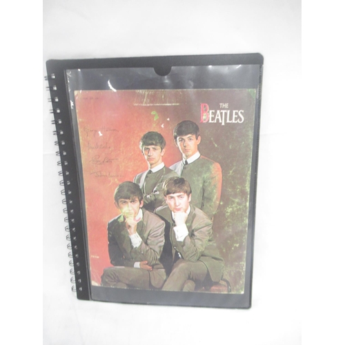 927 - Beatles -  folder cont. 14 negatives and transparencies relating to the Beatles, some framed in card... 