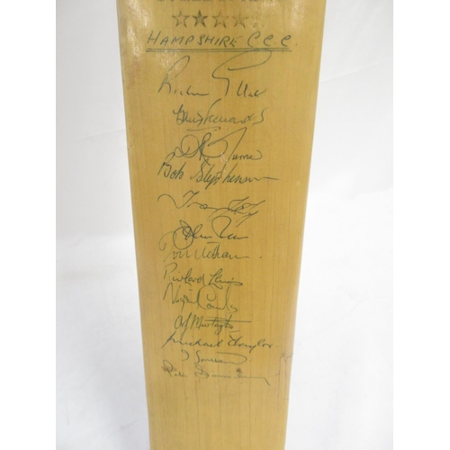 936 - Multi-Signed Cricket bat, signed by team members of Hampshire C.C.C. and Northamptonshire C.C.C.