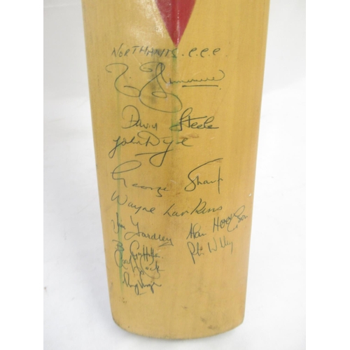 936 - Multi-Signed Cricket bat, signed by team members of Hampshire C.C.C. and Northamptonshire C.C.C.