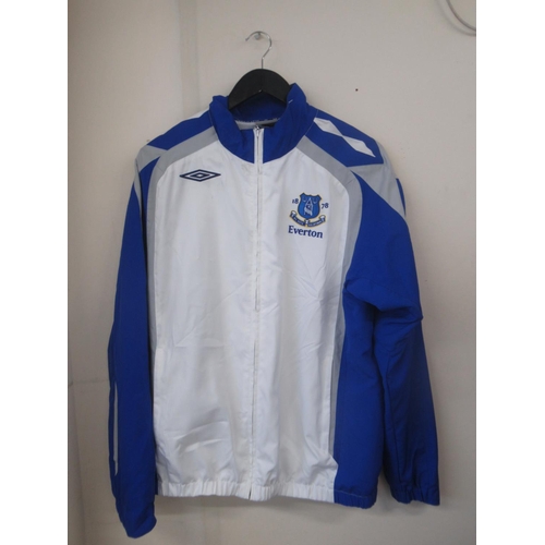 935 - Everton F.C. - Large collection of Everton F.C. football shirts, tracksuit tops,etc., in various siz... 