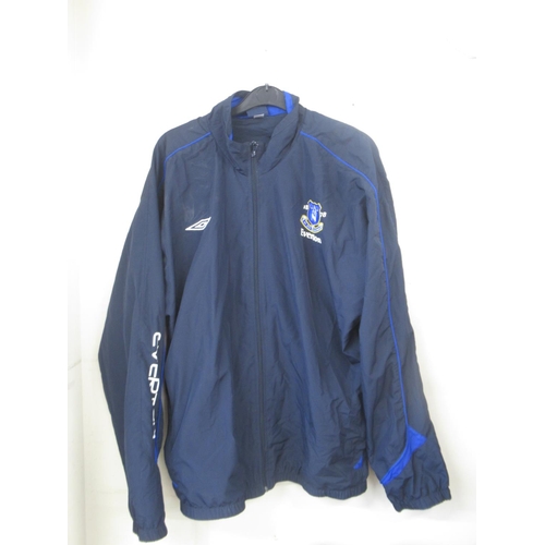 935 - Everton F.C. - Large collection of Everton F.C. football shirts, tracksuit tops,etc., in various siz... 