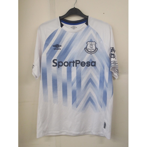 935 - Everton F.C. - Large collection of Everton F.C. football shirts, tracksuit tops,etc., in various siz... 