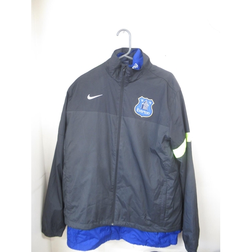 935 - Everton F.C. - Large collection of Everton F.C. football shirts, tracksuit tops,etc., in various siz... 