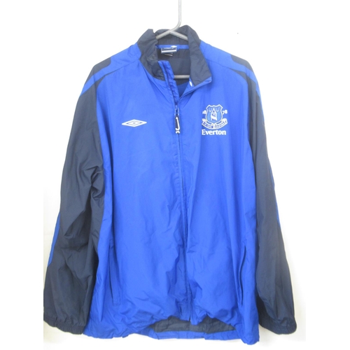 935 - Everton F.C. - Large collection of Everton F.C. football shirts, tracksuit tops,etc., in various siz... 