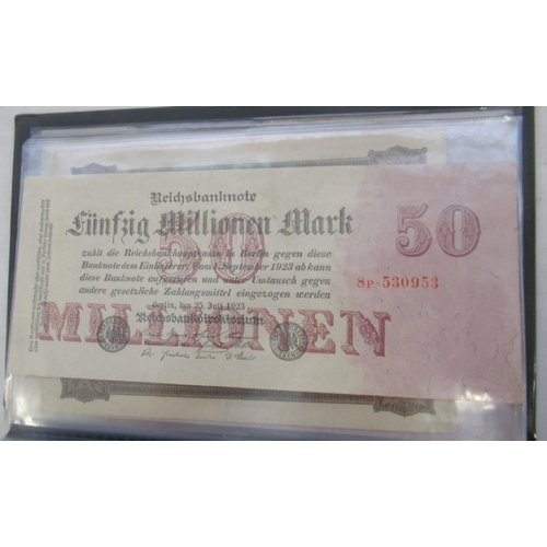 814 - Red banknotes folder cont. c20th Polish, Italian, Algerian and German banknotes (103)