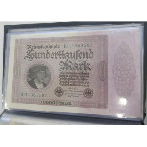 814 - Red banknotes folder cont. c20th Polish, Italian, Algerian and German banknotes (103)