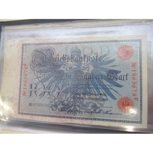 814 - Red banknotes folder cont. c20th Polish, Italian, Algerian and German banknotes (103)