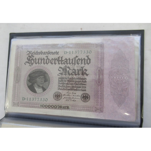 814 - Red banknotes folder cont. c20th Polish, Italian, Algerian and German banknotes (103)