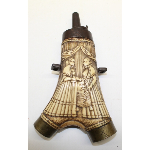 167 - 16th/17th century German stag horn powder flask, the outer face carved with a depiction of Judith an... 