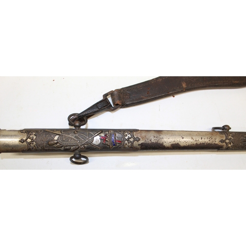 243 - Early 20th century American Masonic lodge sword, named to 'R M Davies' complete with leather studded... 