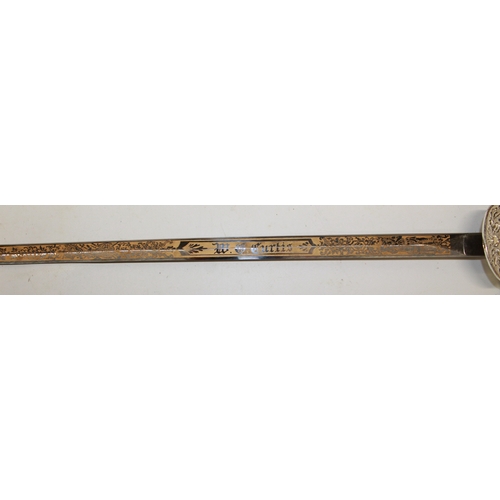 244 - Early 20th century American FCB lodge sword, named to 'W G Curtis, with gilt and etched detail to th... 