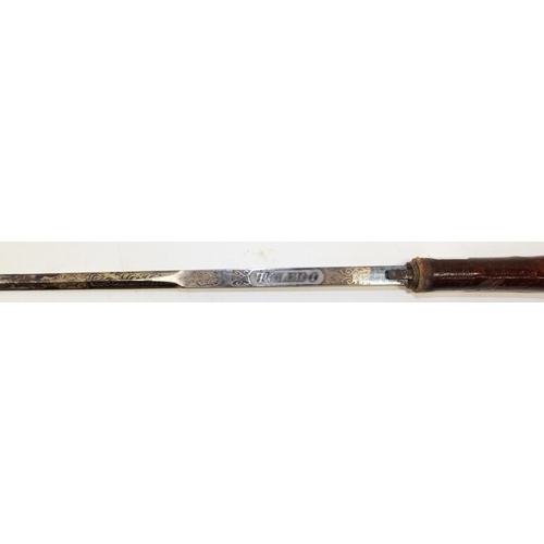 247 - Late Victorian Toledo made blue and gilt etched bladed cane sword, 27