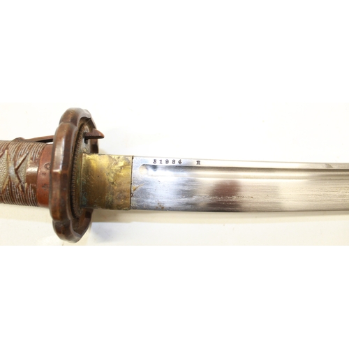 250 - WWII era Japanese NCO'S sword, cast aluminium grip with fastening lever and stamped markings, 27.5