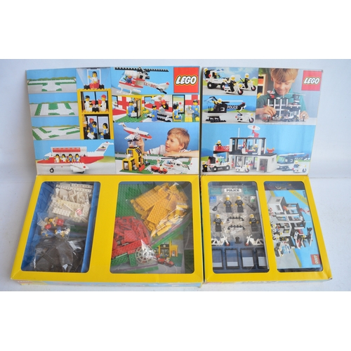 1402 - Two C1980's boxed Lego sets to include 6386 Police station (1986, box complete with inner clear plas... 