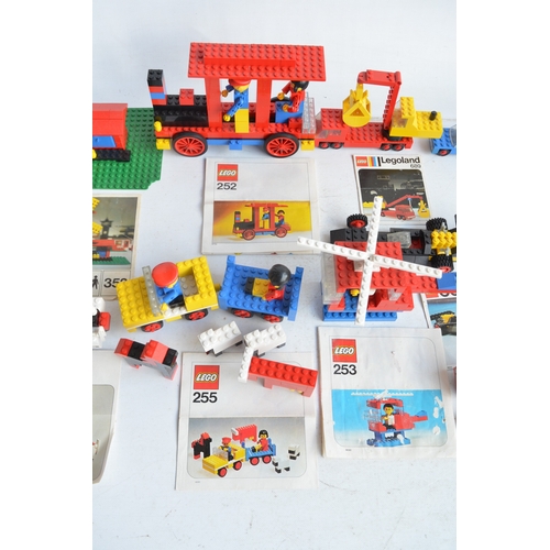 1404 - Nineteen vintage unboxed Lego/Legoland Town sets, all sets complete and all with original instructio... 