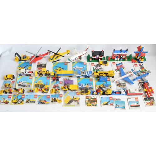 1405 - Twenty seven unboxed vintage Lego sets, C1970-80's to include construction, helicopters, aircraft, h... 