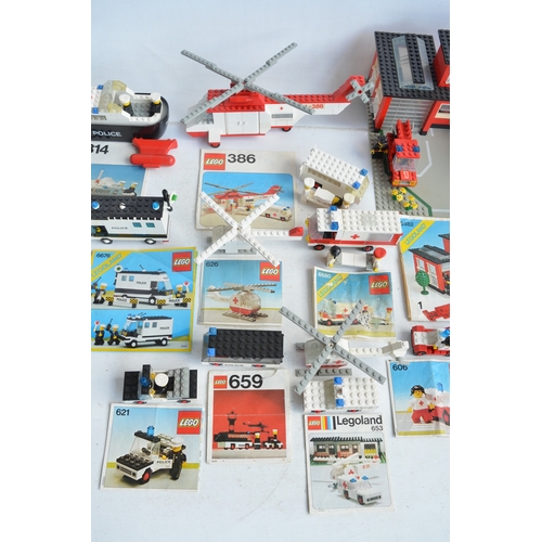 1406 - Twenty six unboxed vintage Lego Police, Fire and Ambulance sets all C1970-80's plus boxed set 6358, ... 