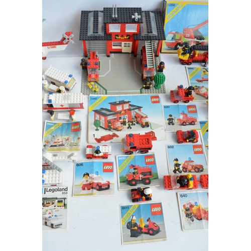 1406 - Twenty six unboxed vintage Lego Police, Fire and Ambulance sets all C1970-80's plus boxed set 6358, ... 