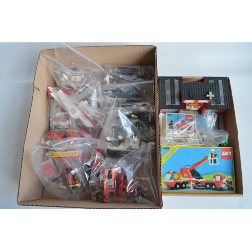 1406 - Twenty six unboxed vintage Lego Police, Fire and Ambulance sets all C1970-80's plus boxed set 6358, ... 