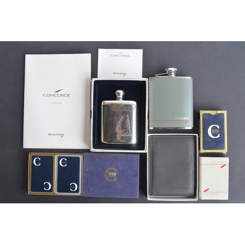 991 - Collection of genuine British Airways Concorde themed ephemera to include hip flasks, playing cards,... 